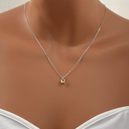 Citrine pendant necklace in sterling silver on model.