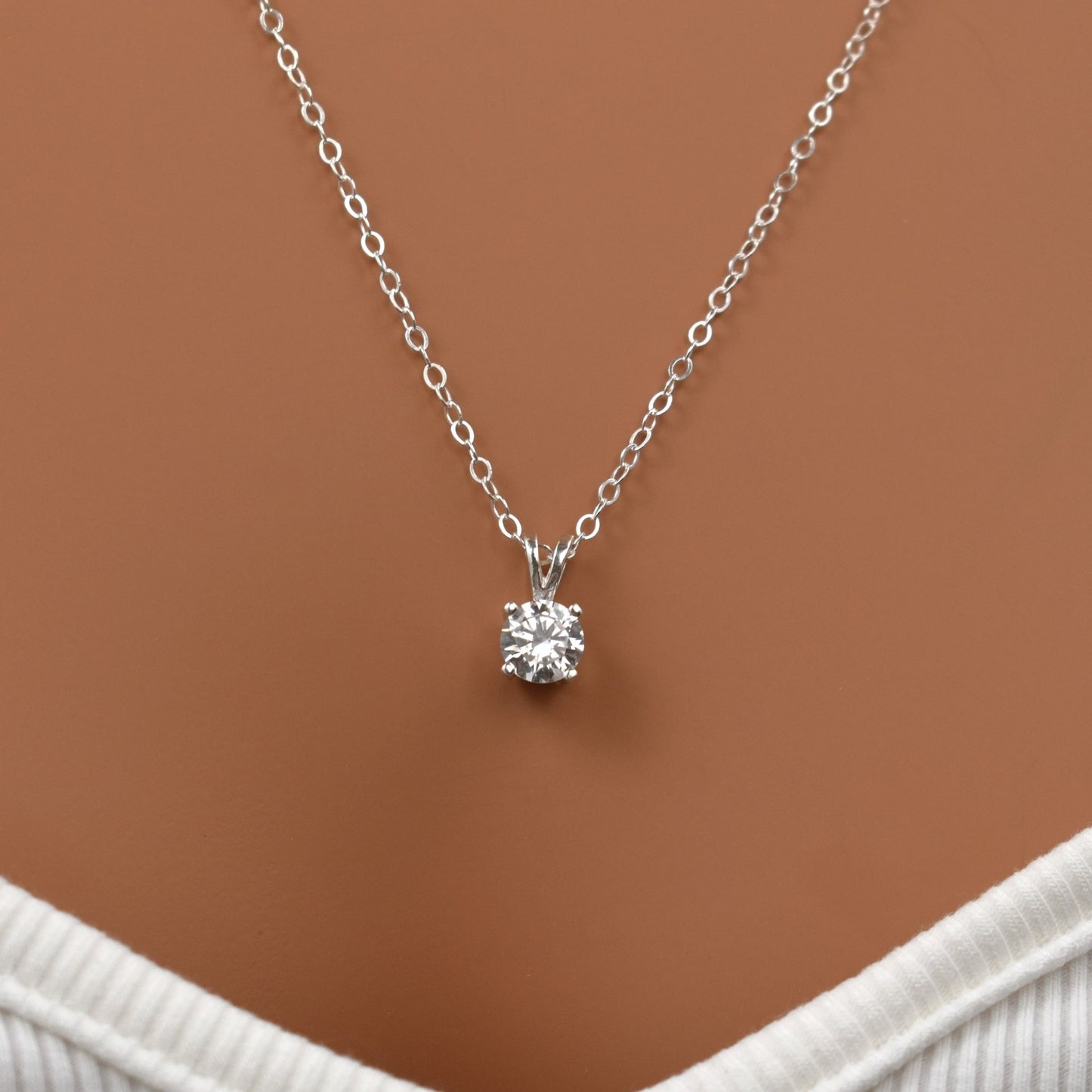 Sterling silver cubic zirconia pendant necklace.