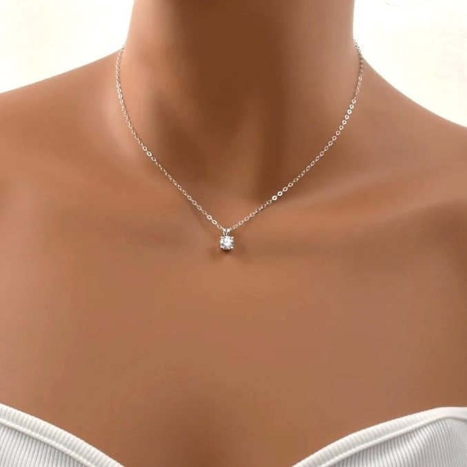 Sterling silver cubic zirconia pendant necklace on model.