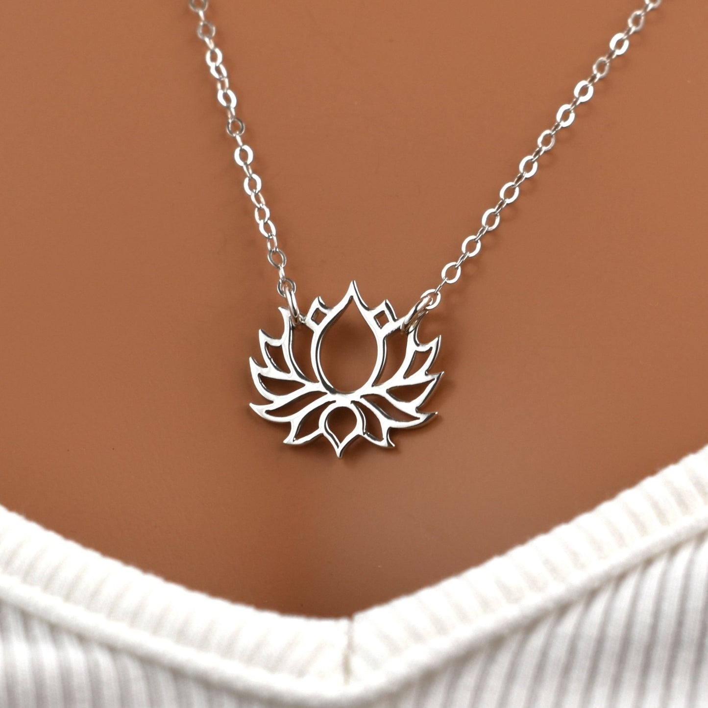 Sterling silver lotus flower necklace.