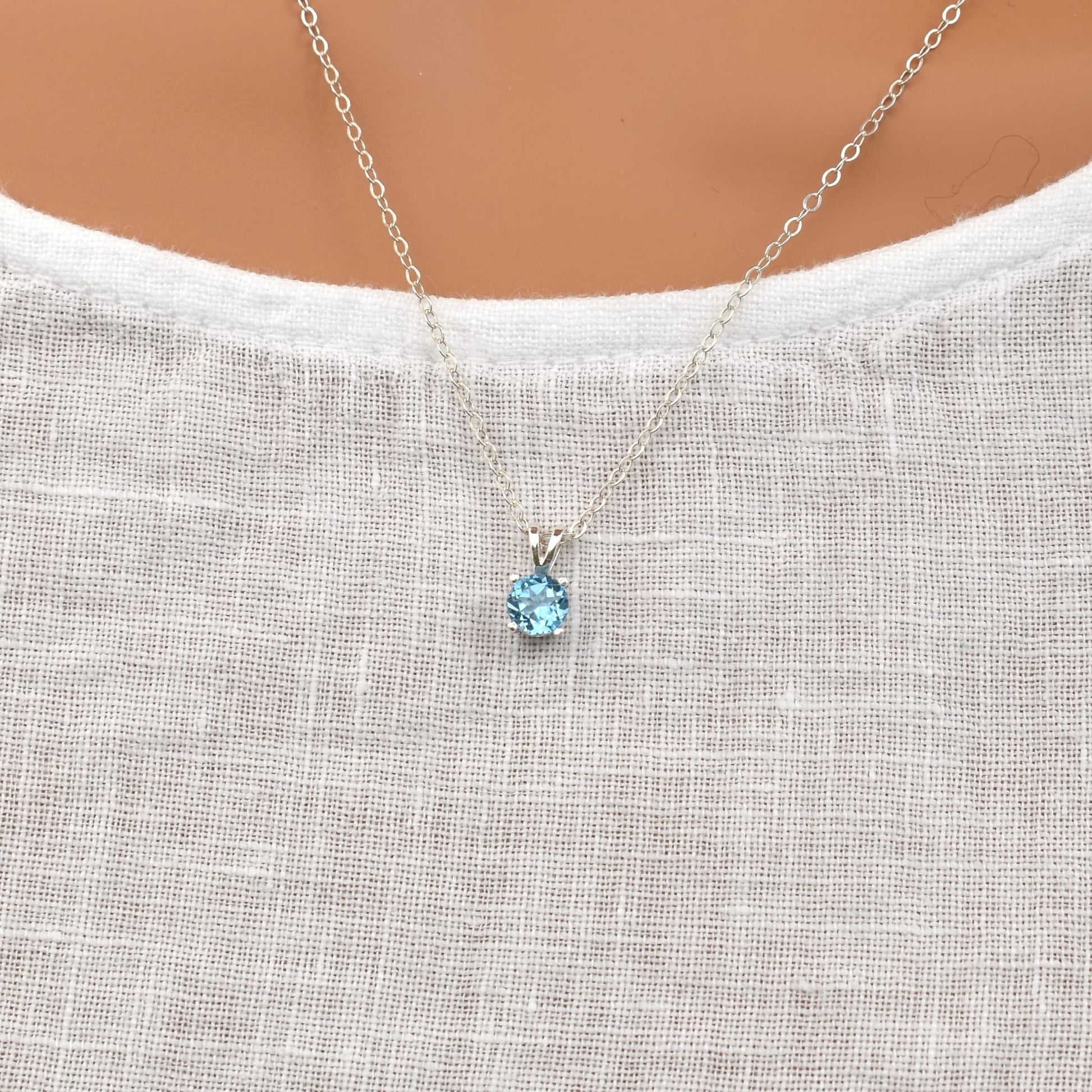 Swiss blue topaz pendant necklace on a sterling silver chain.