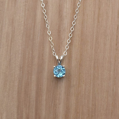 Swiss blue topaz pendant necklace on a sterling silver chain.