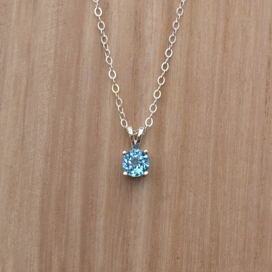 Swiss blue topaz pendant necklace on a sterling silver chain.