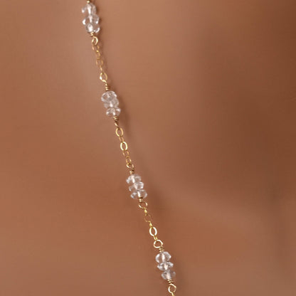 Clear quartz crystal bead necklace close up.