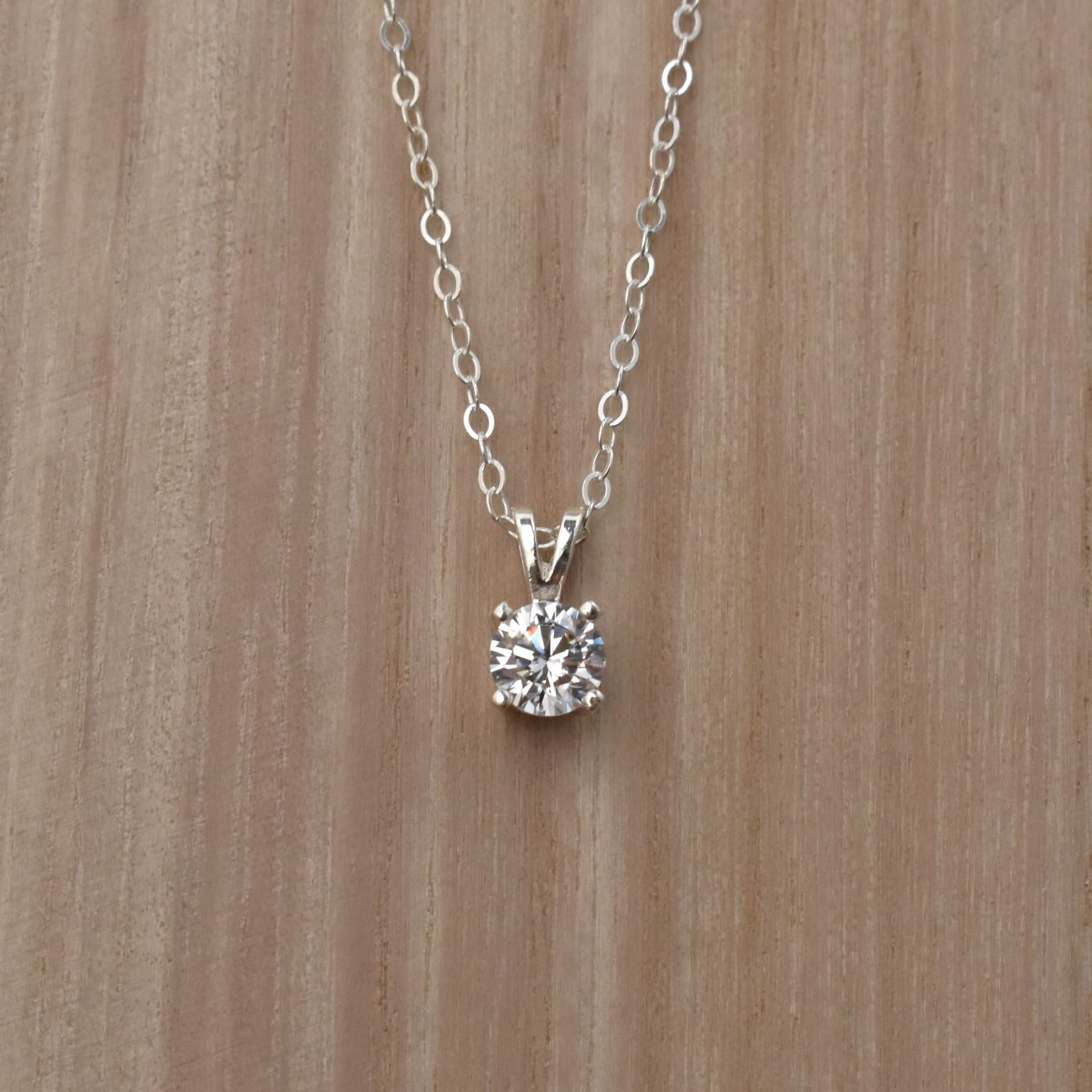 Cubic zirconia pendant necklace in sterling silver.