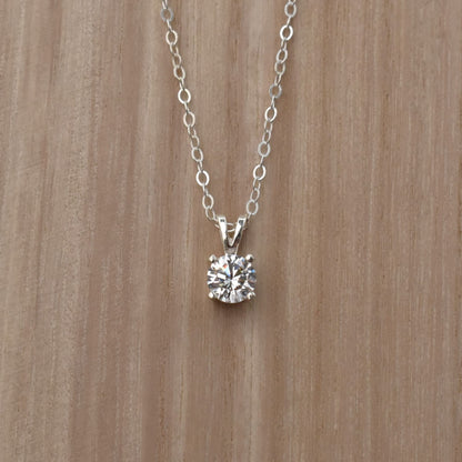 Cubic zirconia pendant necklace in sterling silver.