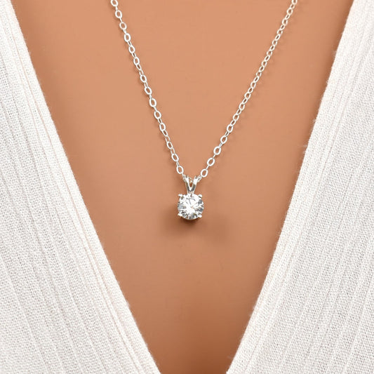 Cubic zirconia pendant necklace in sterling silver.