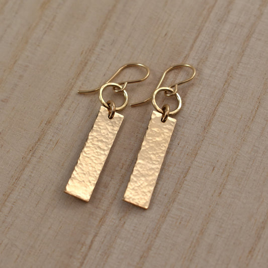 Gold rectangle and circle dangle earrings.